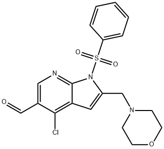 1H-pirolo[2,3-b]piridin-5-karboksaldehidas, 4-chlor-2-(4-morfolinilmetil)-1-(fenilsulfonil)-